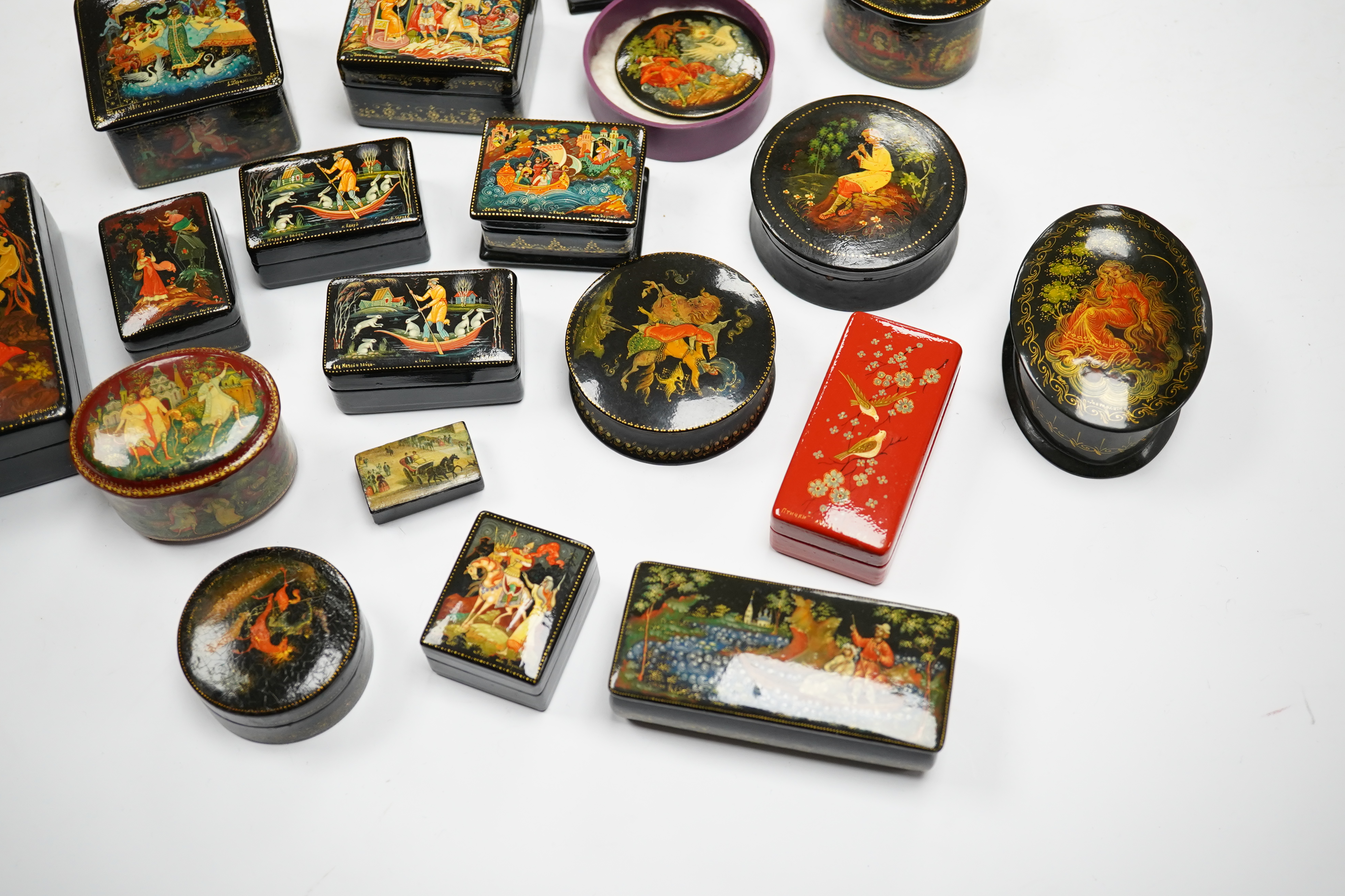 A quantity of late 19th / early 20th century Russian lacquer boxes, largest 9cm. Condition - mostly good